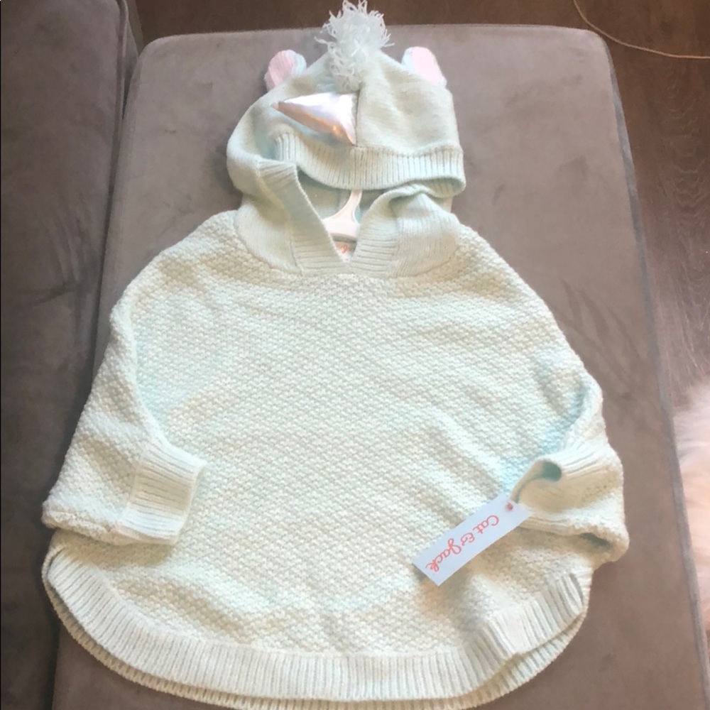 Cute Sky blue poncho sweater material.